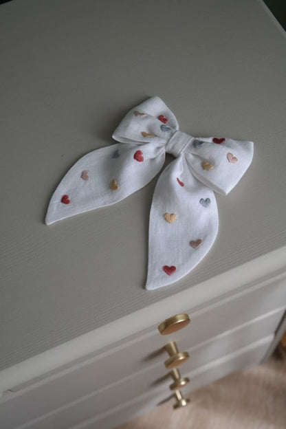 Embroider your own hair accessory, sip & meet new friends!